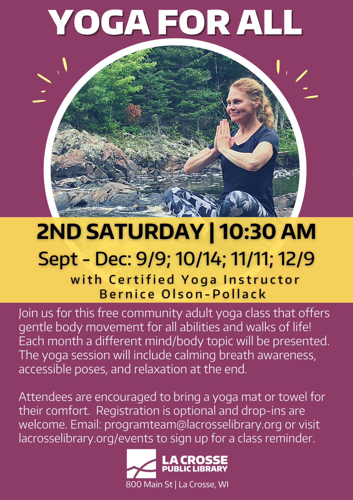 woman seated cross legged on a rock