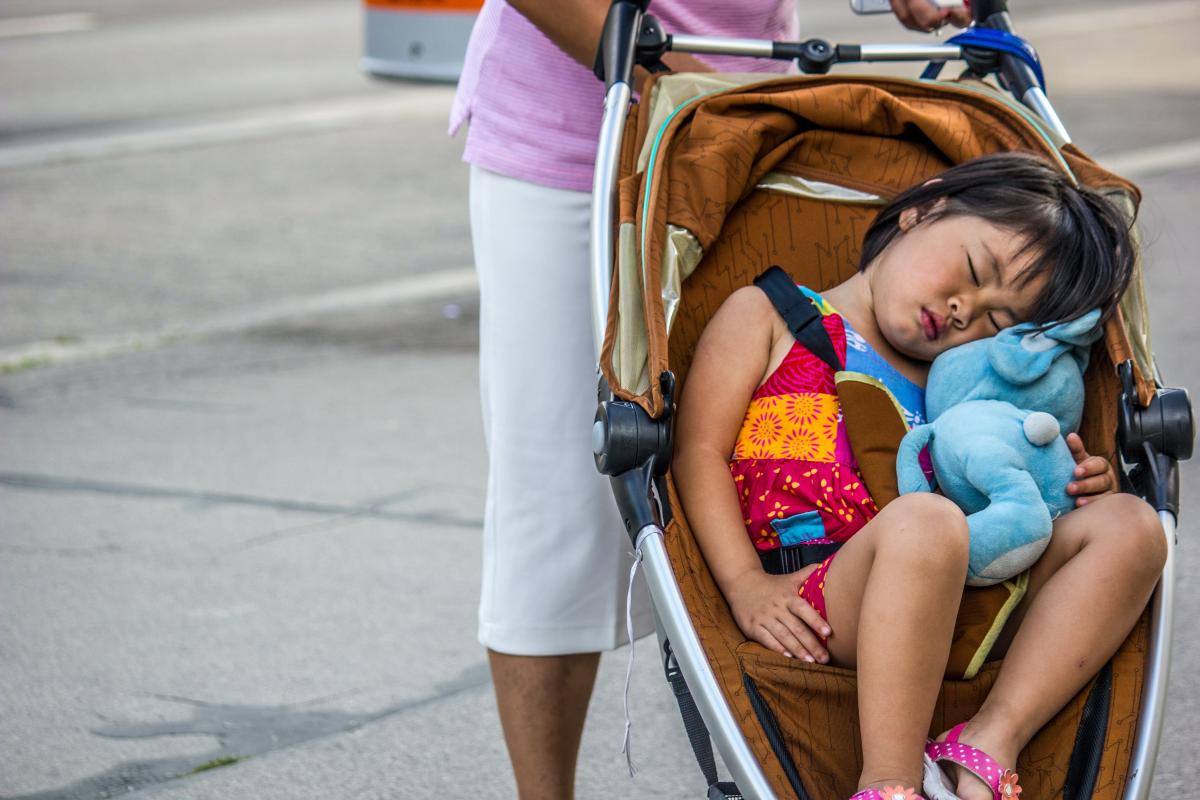 Toddler asleep in stroller